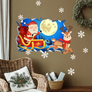 Vue macro de sticker mural 3D de Noël avec Père Noël et renne sur un mur marron