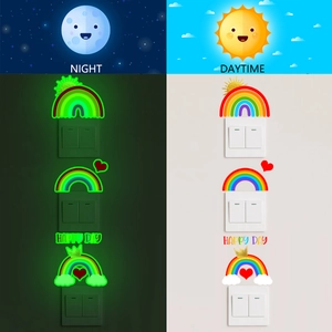 Luminous Happy Day rainbow switch sticker showing day and night fluorescent effect