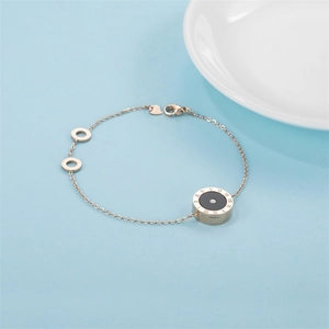 Bracelet en acier inoxydable or rose avec chiffres romains et pendentif marbre noir