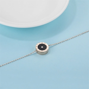 Bracelet en acier inoxydable or rose avec pendentif rond, chiffres romains et cristal