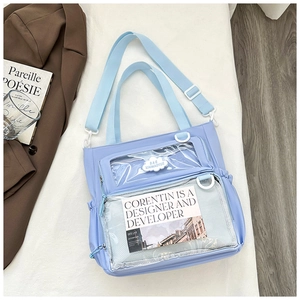 Detail of light purple ita bag featuring large transparent window and spacious storage