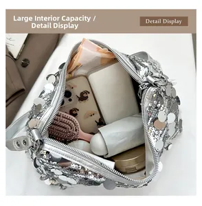Silver sequin handbag showing large capacity interior for phone and daily essentials