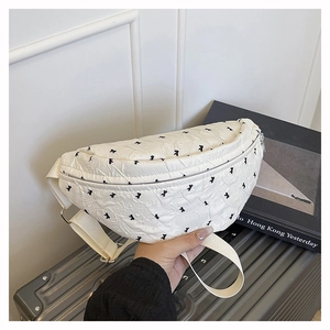 Polka dot large capacity crossbody bag with pleated texture and black bow embroidery