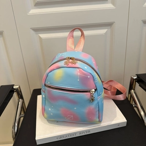 Mini backpack with blue and pink starry gradient print and heart pattern detail