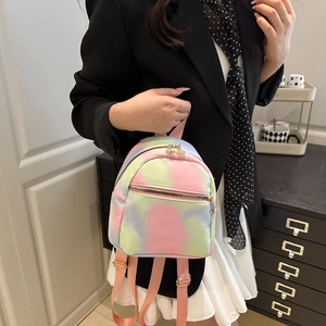 Mini multi-color tie-dye backpack for women with pastel candy tones and gold zipper