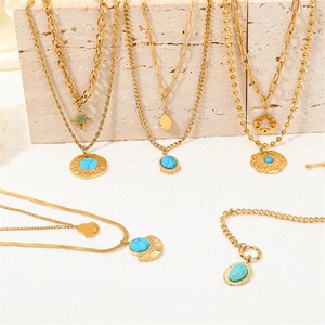 Gold layered stainless steel necklace and bracelet set with turquoise gemstones