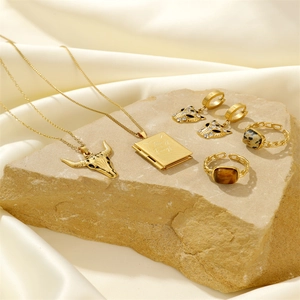 Set di gioielli vintage in acciaio inossidabile dorato con pietre naturali e animali