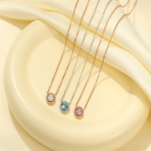 Elegant stainless steel necklaces with oval gemstone pendants in rose gold and silver