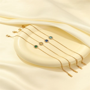 Elegant gold stainless steel bracelets featuring colorful gemstones and zircon halo accents