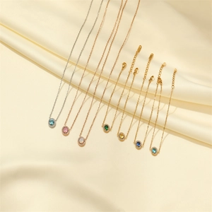 Elegant stainless steel jewelry set featuring colorful gemstones with diamond-encrusted edges