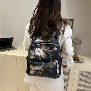 Floral print large capacity black backpack with golden metal zippers for women travel