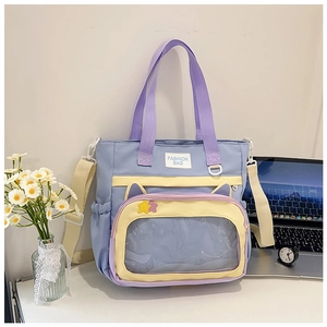 Detail of lavender ita bag featuring a transparent display window and cat ear design