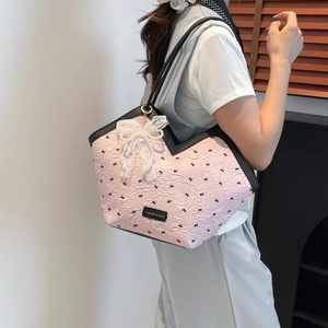 Pink pleated tote bag with black bow embroidery and lace pearl charm accessory