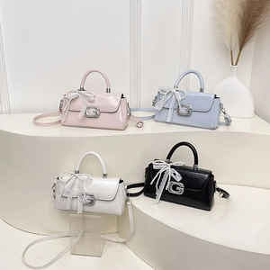 Minimalist square crossbody bags in colorful patent leather with G-buckle and pearl bow