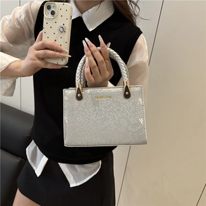 Silver snakeskin textured tote bag with woven handles and Fashion Bags metal logo