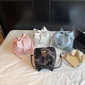Chic drawstring canvas bucket bag with colorful wavy embroidery in four pastel colors