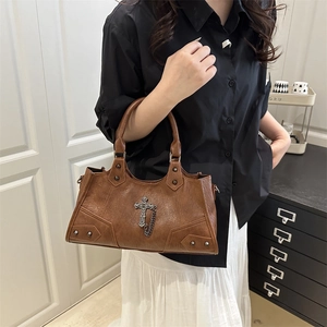 Vintage brown leather punk tote bag with metal cross, silver chains and rivets