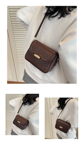 Close-up of brown PU leather bag featuring a gold cylindrical metal turn-lock closure