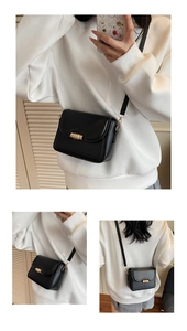 Detailed views of a black crossbody bag with gold cylindrical lock and leather strap