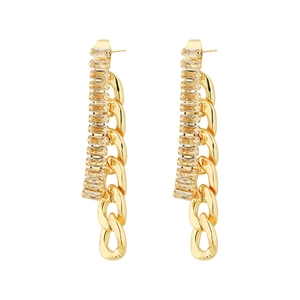 Close-up of gold tassel earrings with cubic zirconia stones and Cuban link chain