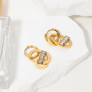 Long gold tassel earrings with interlocking rings and baguette zircon stones in 18K plating