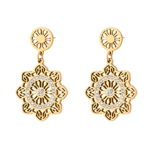 Detail of gold hollow mandala earrings with octagonal star pendant and rhinestones