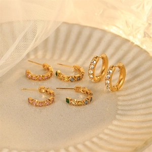 Gold-plated stainless steel C-shaped earrings with colorful cubic zirconia in tray