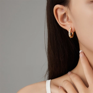 Elegant gold-plated C-shaped stainless steel earrings with sparkling white cubic zirconia