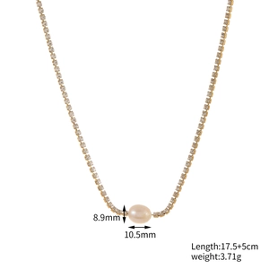 Minimalist gold necklace with a central 10.5mm pearl and sparkling diamond accents