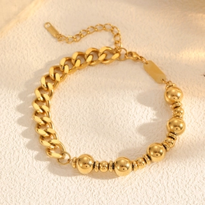 Adjustable golden stainless steel Cuban link bracelet with polished beads and lobster clasp