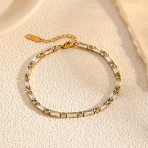 Elegant gold stainless steel bracelet with green and clear zircon stones in a French style