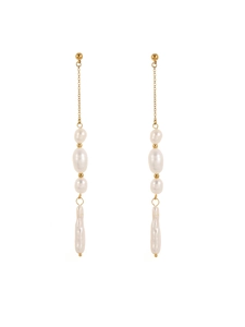 Detail of vintage gold tassel earrings featuring cascading pearls and baroque drops