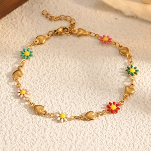 Bracelet coeur marguerite doré avec fleurs en émail coloré et chaîne réglable