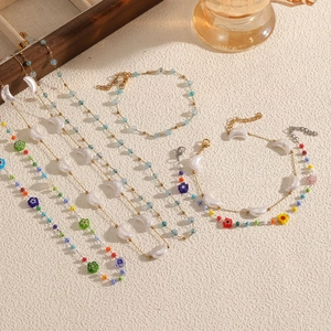 Elegant moon pendant beaded necklace and bracelet set in polished stainless steel