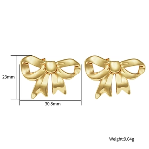 Golden bow-shaped earrings in stainless steel, front view with dimensions 23mm by 30.8mm