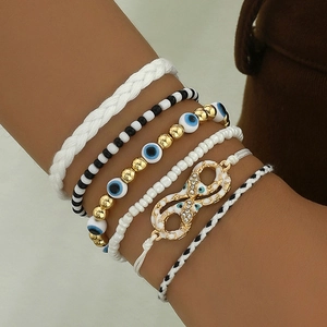 Ensemble de bracelets bohème multicouches avec œil protecteur et infini