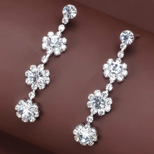 Sparkling silver floral dangle earrings with triple flower cubic zirconia crystals