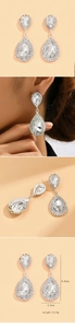 Detailed view of silver crystal teardrop earrings showing 5cm length and 2cm width