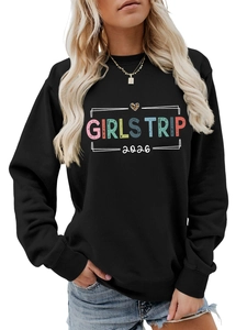 Detail of Girls Trip 2026 black crewneck sweatshirt with leopard heart print and ribbed cuffs