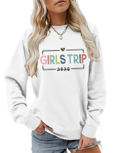 Detail view of Girls Trip 2026 white sweatshirt with leopard heart and ribbed cuffs