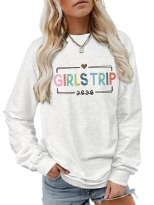 Close-up of Girls Trip 2024 print and leopard heart on light grey sweatshirt fabric