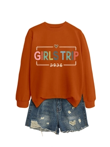 Detail of Girls Trip 2026 sweatshirt with leopard heart print and denim shorts