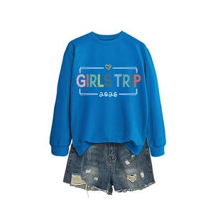 Royal blue Girls Trip 2026 sweatshirt paired with distressed denim shorts for summer
