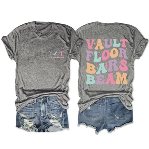 Front and back view of girls gymnastics t-shirt with vault floor bars beam text and denim shorts