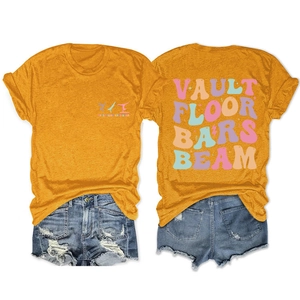 Front and back view of mustard yellow gymnastic t-shirt with vault floor bars beam text