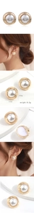 Detail view showing 2cm round pearl earrings with textured gold border on model