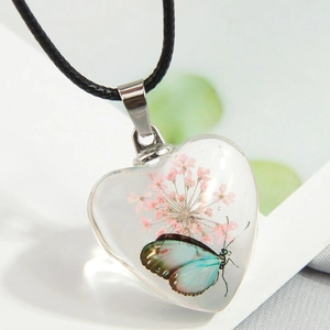 Handmade heart resin pendant necklace with butterfly and pink dried flowers detail