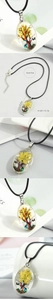 Detailed view of Tree of Life oval resin pendant with dimensions and black cord chain