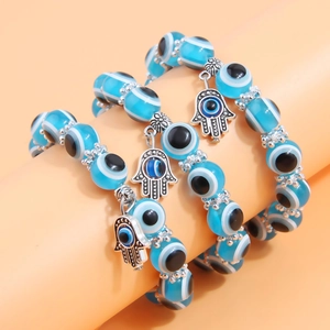 Three-layer blue evil eye beaded bracelet set with silver Hamsa Hand charms for women