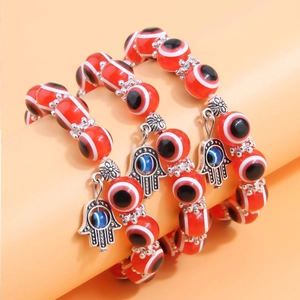 Three-layer red evil eye beaded bracelet set with silver Hamsa hand pendants